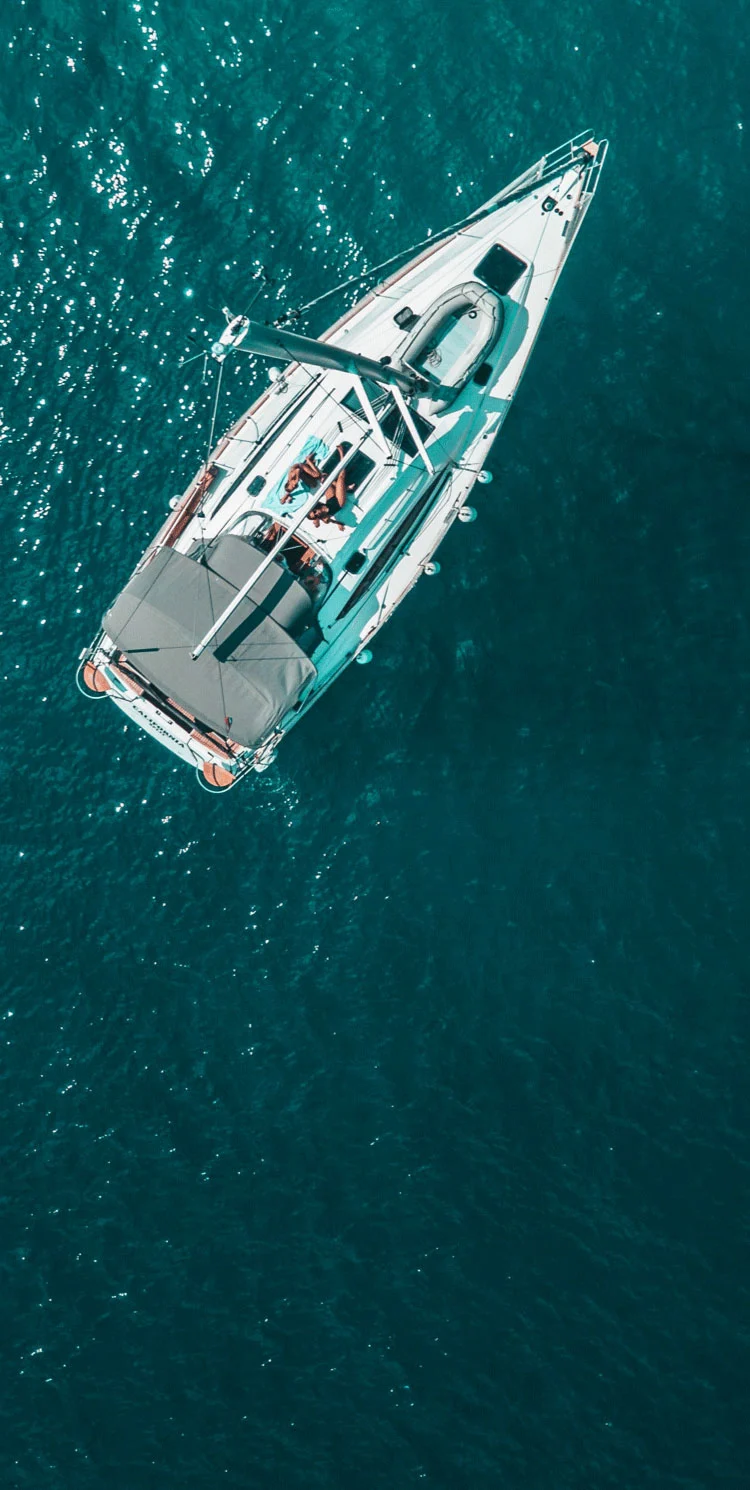 Sailing yacht in turquoise water